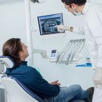 albuquerque dentist pointing at xray